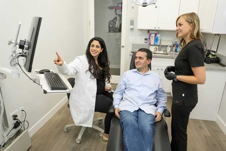 Smille Boutique Dental Clinic in Thousand Oaks, CA - Doctor Consulting with patient